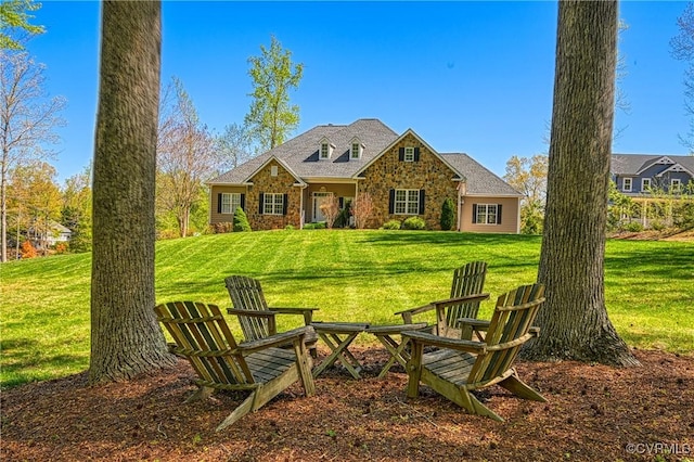 1729 Lake Forest Dr, Mineral, VA 23117 - back of house with a lawn and stone siding