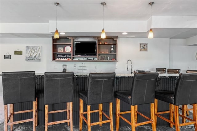 1729 Lake Forest Dr, Mineral, VA 23117 - bar featuring visible vents, pendant lighting, a sink, and wet bar