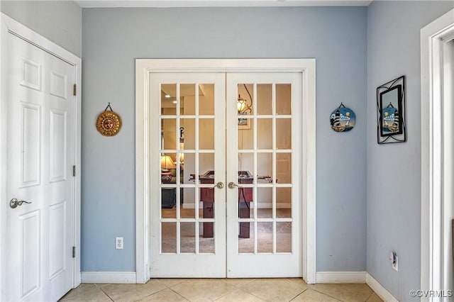 1729 Lake Forest Dr, Mineral, VA 23117 - doorway featuring baseboards, light tile patterned floors, and french doors