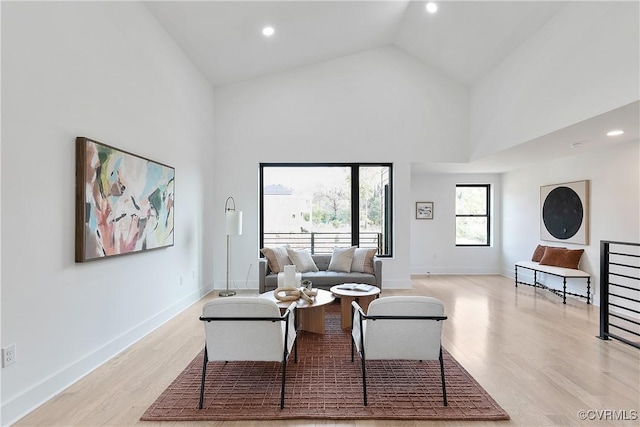 1613 Pulaski St, Richmond, VA 23222 - living area featuring recessed lighting, high vaulted ceiling, baseboards, and wood finished floors