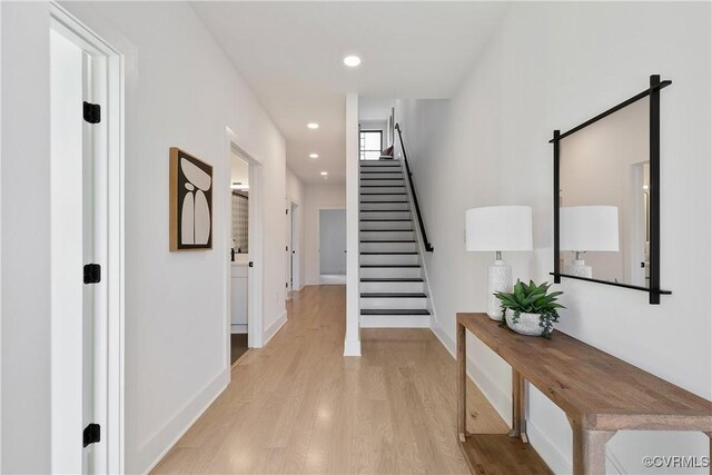 1613 Pulaski St, Richmond, VA 23222 - hall with recessed lighting, baseboards, stairs, and light wood finished floors