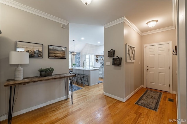 1635 Dorset Meadows Ln, Powhatan, VA 23139 - foyer entrance featuring light wood-style floors and crown molding