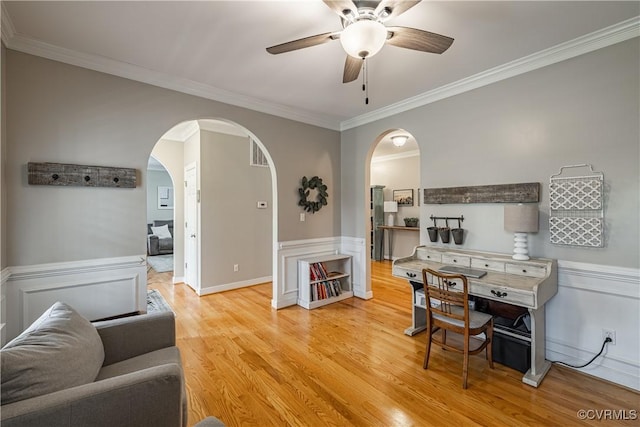 1635 Dorset Meadows Ln, Powhatan, VA 23139 - living room featuring a ceiling fan, arched walkways, ornamental molding, and light wood-type flooring