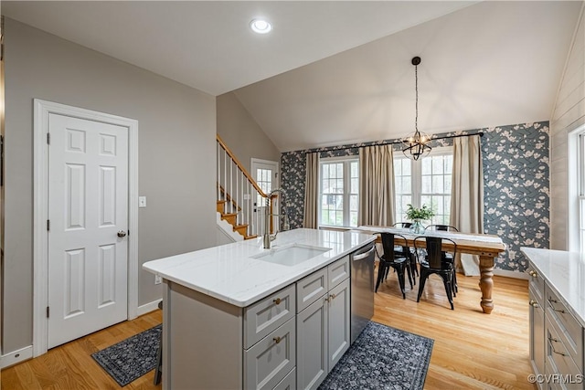 1635 Dorset Meadows Ln, Powhatan, VA 23139 - kitchen featuring dishwasher, vaulted ceiling, gray cabinets, wallpapered walls, and light wood-style flooring