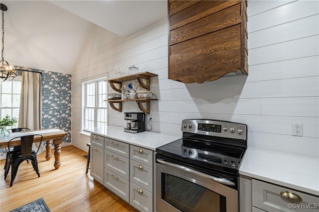 1635 Dorset Meadows Ln, Powhatan, VA 23139 - kitchen with stainless steel range with electric cooktop, gray cabinetry, lofted ceiling, wallpapered walls, and light wood-style floors