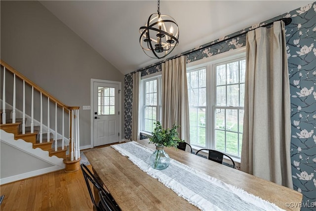 1635 Dorset Meadows Ln, Powhatan, VA 23139 - dining room with vaulted ceiling, a chandelier, wood finished floors, and stairway