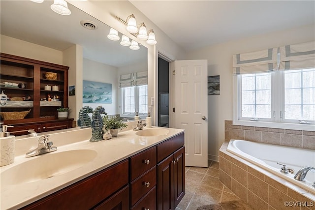 1635 Dorset Meadows Ln, Powhatan, VA 23139 - full bathroom featuring a bath, double vanity, and tile patterned flooring
