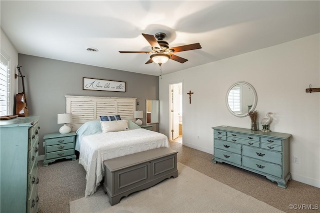 1635 Dorset Meadows Ln, Powhatan, VA 23139 - bedroom with multiple windows, light carpet, ceiling fan, and ensuite bath