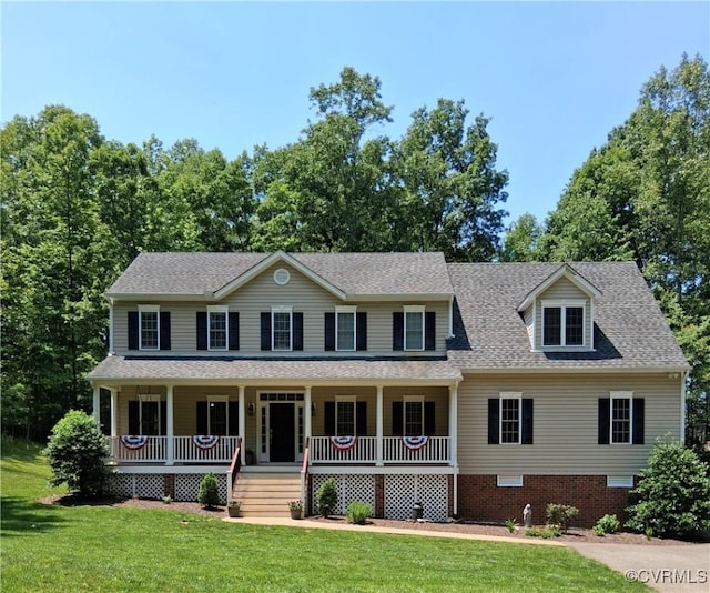 1635 Dorset Meadows Ln, Powhatan, VA 23139 - colonial-style house featuring a front yard, a porch, and roof with shingles
