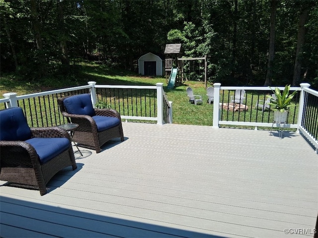1635 Dorset Meadows Ln, Powhatan, VA 23139 - deck with a storage unit, a yard, and a playground