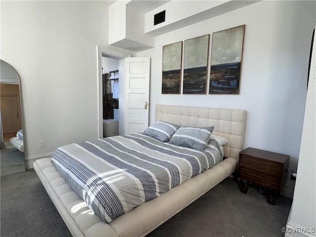 bedroom featuring visible vents, carpet floors, and baseboards