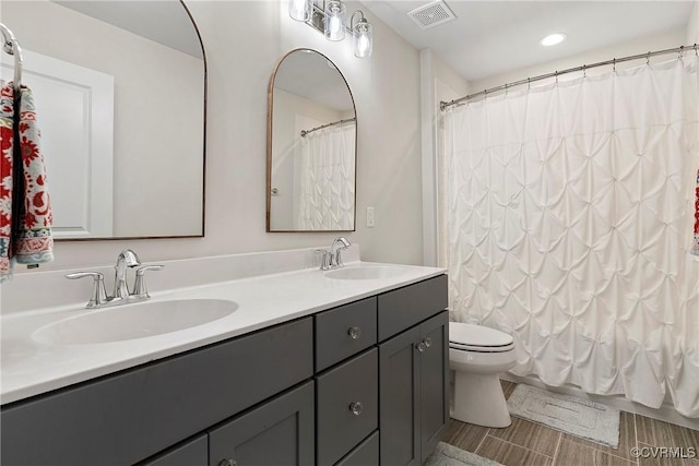 703 W Vaughan Rd, Hanover, VA 23005 - full bath with double vanity and toilet
