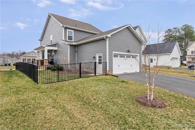 703 W Vaughan Rd, Hanover, VA 23005 - view of side of home with driveway and an attached garage