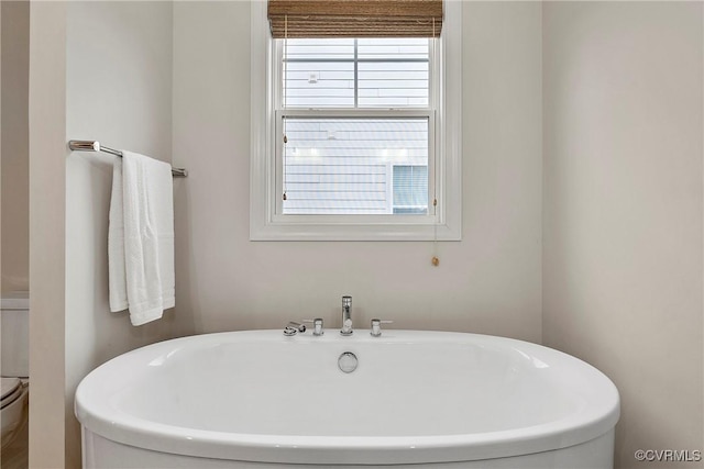 703 W Vaughan Rd, Hanover, VA 23005 - full bathroom featuring a freestanding bath and healthy amount of natural light