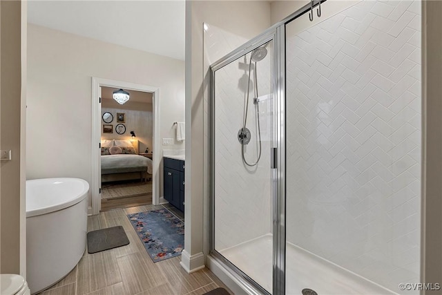703 W Vaughan Rd, Hanover, VA 23005 - full bath with a stall shower, ensuite bath, a freestanding bath, and vanity