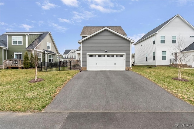 703 W Vaughan Rd, Hanover, VA 23005 - view of property exterior featuring driveway and a garage