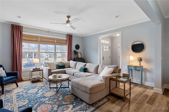 703 W Vaughan Rd, Hanover, VA 23005 - living area featuring healthy amount of natural light, ceiling fan, wood finished floors, and crown molding