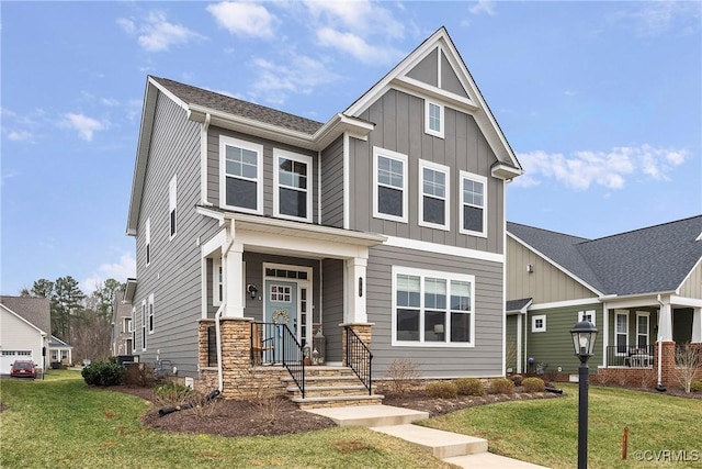 703 W Vaughan Rd, Hanover, VA 23005 - craftsman house with board and batten siding and a front yard