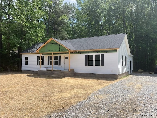 5008 Chestnut Fork Rd, Gloucester, VA 23061 - view of front facade featuring a porch, crawl space, a shingled roof, and gravel driveway