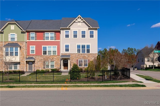 6328 Gossamer Aly, Moseley, VA 23120 - multi unit property with a fenced front yard and stone siding