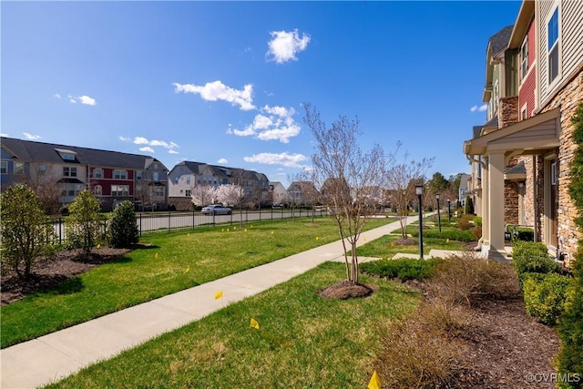 6328 Gossamer Aly, Moseley, VA 23120 - surrounding community featuring a yard, fence, and a residential view