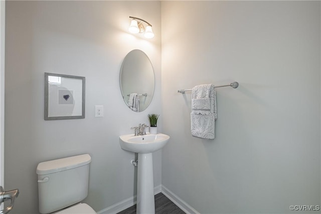 6328 Gossamer Aly, Moseley, VA 23120 - half bath featuring baseboards, a sink, and toilet