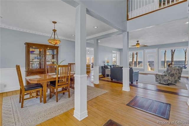 289 Oyster Shell Rd, Laneview, VA 22560 - dining space with hardwood / wood-style flooring, decorative columns, and ceiling fan