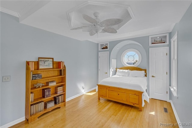 289 Oyster Shell Rd, Laneview, VA 22560 - bedroom with light wood-style flooring, crown molding, baseboards, and ceiling fan