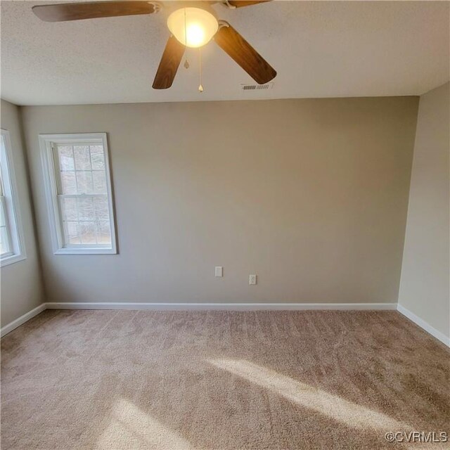 6118 Pond Grass Rd, Mechanicsville, VA 23111 - unfurnished room featuring baseboards, a textured ceiling, carpet floors, visible vents, and a ceiling fan