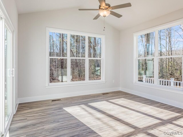 LOT73 Dove Ct, Louisa, VA 23024 - empty room featuring visible vents, a healthy amount of sunlight, ceiling fan, and vaulted ceiling