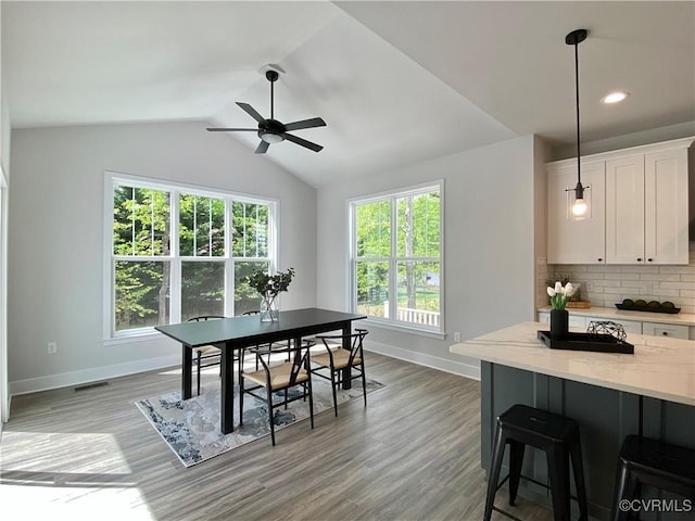 LOT73 Dove Ct, Louisa, VA 23024 - dining space featuring light wood finished floors, baseboards, lofted ceiling, and ceiling fan