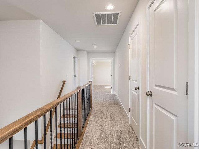 LOT73 Dove Ct, Louisa, VA 23024 - hallway featuring visible vents, an upstairs landing, recessed lighting, carpet, and baseboards