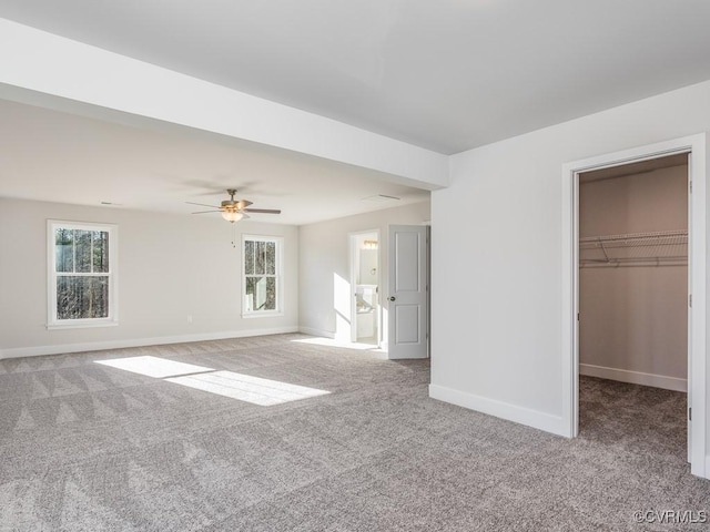 LOT73 Dove Ct, Louisa, VA 23024 - unfurnished bedroom featuring multiple windows, carpet flooring, and baseboards