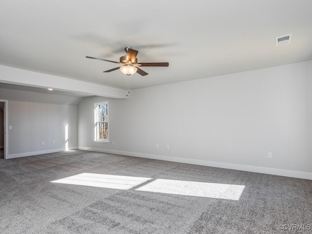 LOT73 Dove Ct, Louisa, VA 23024 - spare room with a ceiling fan, visible vents, baseboards, vaulted ceiling, and carpet flooring