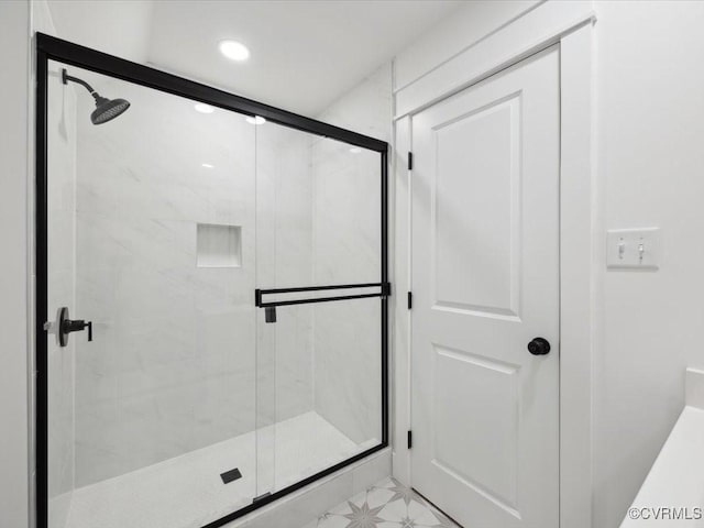 full bathroom featuring a stall shower