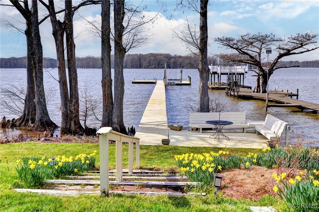 view of dock with a water view