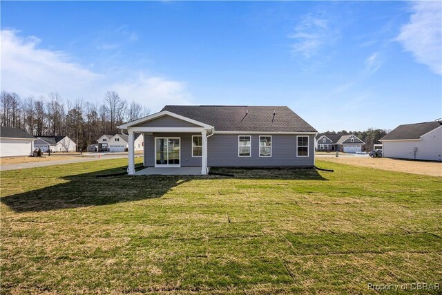 93 Grace Hill Cir, Kilmarnock, VA 22482 - view of front of home with a front lawn