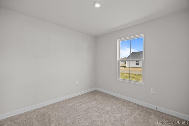 93 Grace Hill Cir, Kilmarnock, VA 22482 - carpeted spare room with baseboards