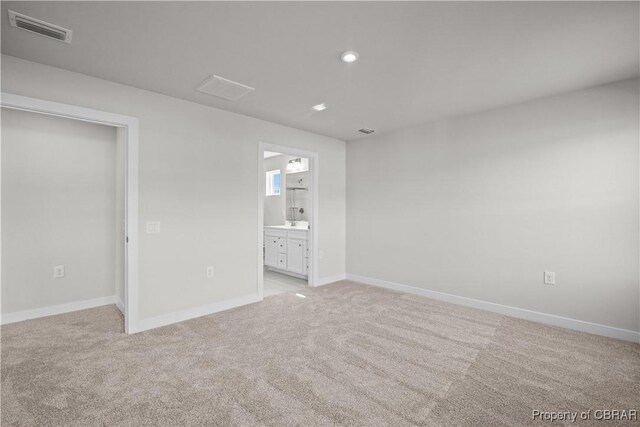 93 Grace Hill Cir, Kilmarnock, VA 22482 - unfurnished room featuring baseboards, visible vents, recessed lighting, and light colored carpet