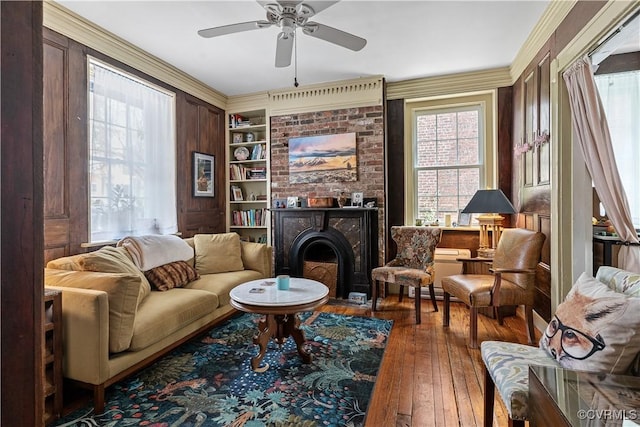 2515 E Grace St, Richmond, VA 23223 - living area with built in features, wood-type flooring, and ceiling fan