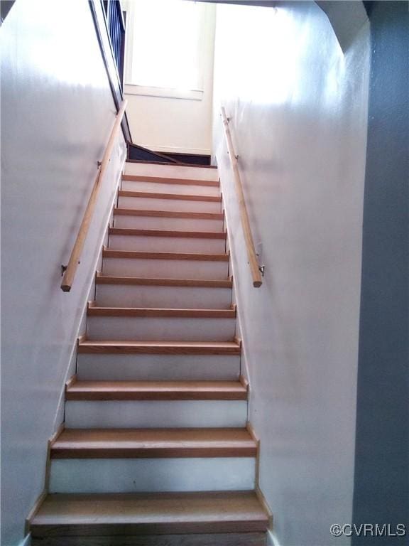 staircase with baseboards
