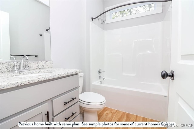 981 Knights Landing Dr, Heathsville, VA 22473 - bathroom with wood finished floors, vanity, and  shower combination