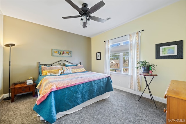 bedroom featuring baseboards, visible vents, ceiling fan, and carpet flooring