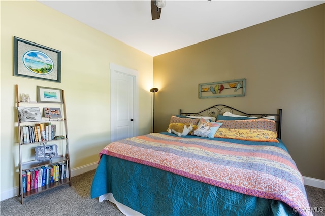 bedroom with baseboards, a ceiling fan, and carpet floors