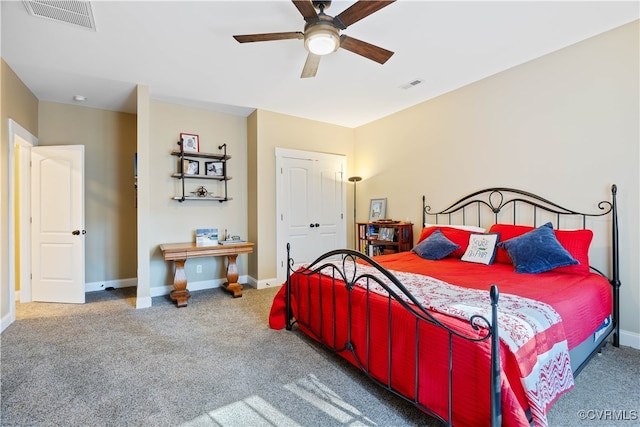 bedroom featuring carpet flooring, visible vents, and baseboards