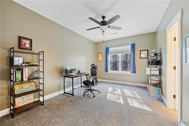 office with ceiling fan, carpet floors, and baseboards