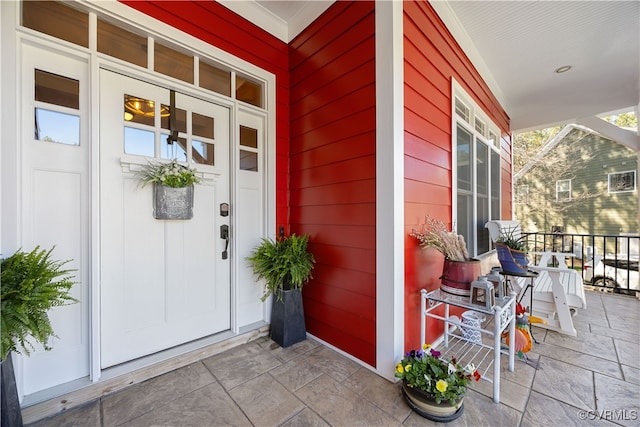 entrance to property with a porch