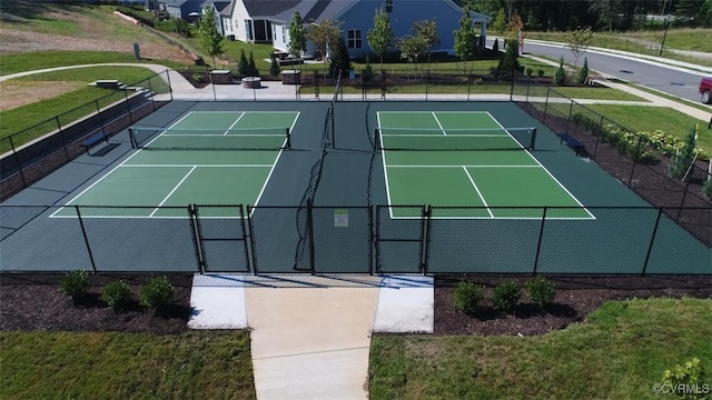 view of sport court with community basketball court, a gate, and fence