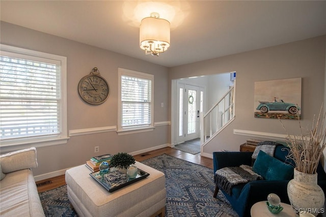 2810 Winterfield Rd, Midlothian, VA 23113 - living area with plenty of natural light, wood finished floors, and stairway