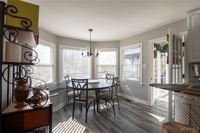 2810 Winterfield Rd, Midlothian, VA 23113 - dining room with a chandelier and dark wood-type flooring
